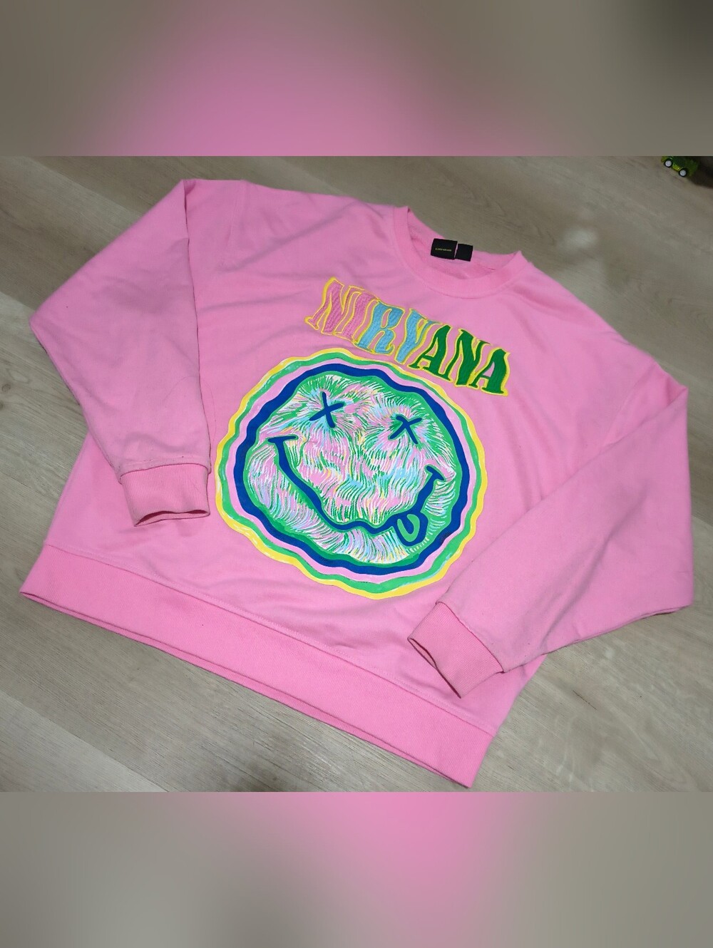NIRVANA Pink Crewneck Sweatshirt with Multicolor Smiley Graphic